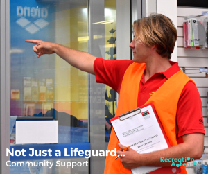 life guard pointing at poster