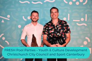 Two men hold a trophy, copy reads: FRESH Pool Parties – Youth & Culture Development Christchurch City Council and Sport Canterbury