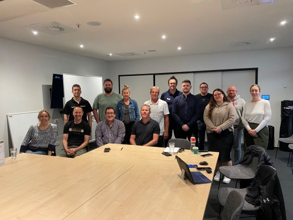 Group Standing in Office