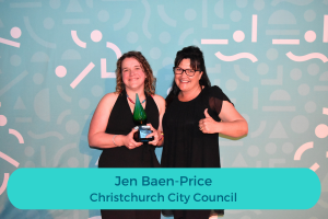 Two women hold a trophy; copy reads: Jen Baen-Price Christchurch City Council