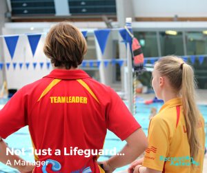 pair of life guards standing facing a pool