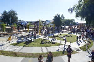 An aerial view of a park with a pump track