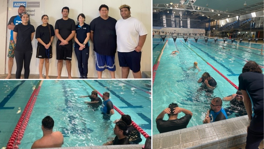 group standing round pool