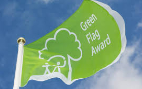 Green Flag Awards Logo on a Green flag against a blue sky