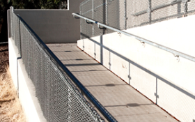 A wheelchair ramp leads up to a building