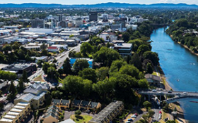 An aerial view of Hamilton with the city to the left and the river to the right