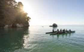 A waka heads out to sea